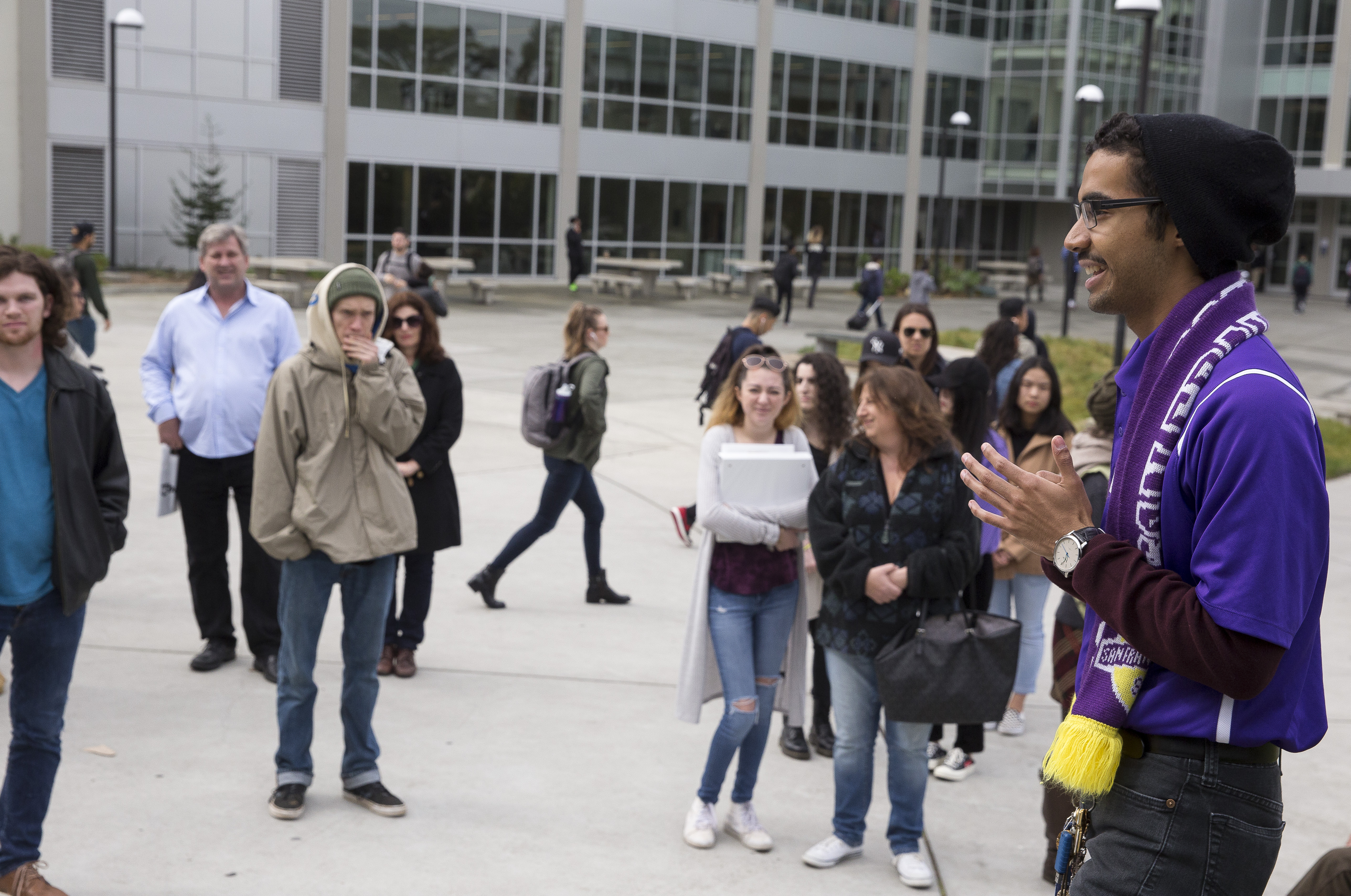 SF State student giving a group tour of the campus